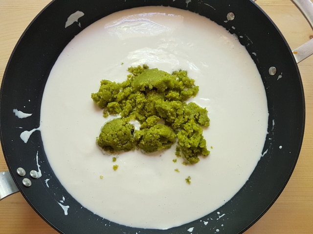 creamed ricotta sauce with pistachio pesto in large frying pan