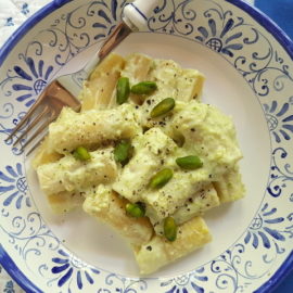 Sicilian ricotta and pistachio pasta in blue and white bowl