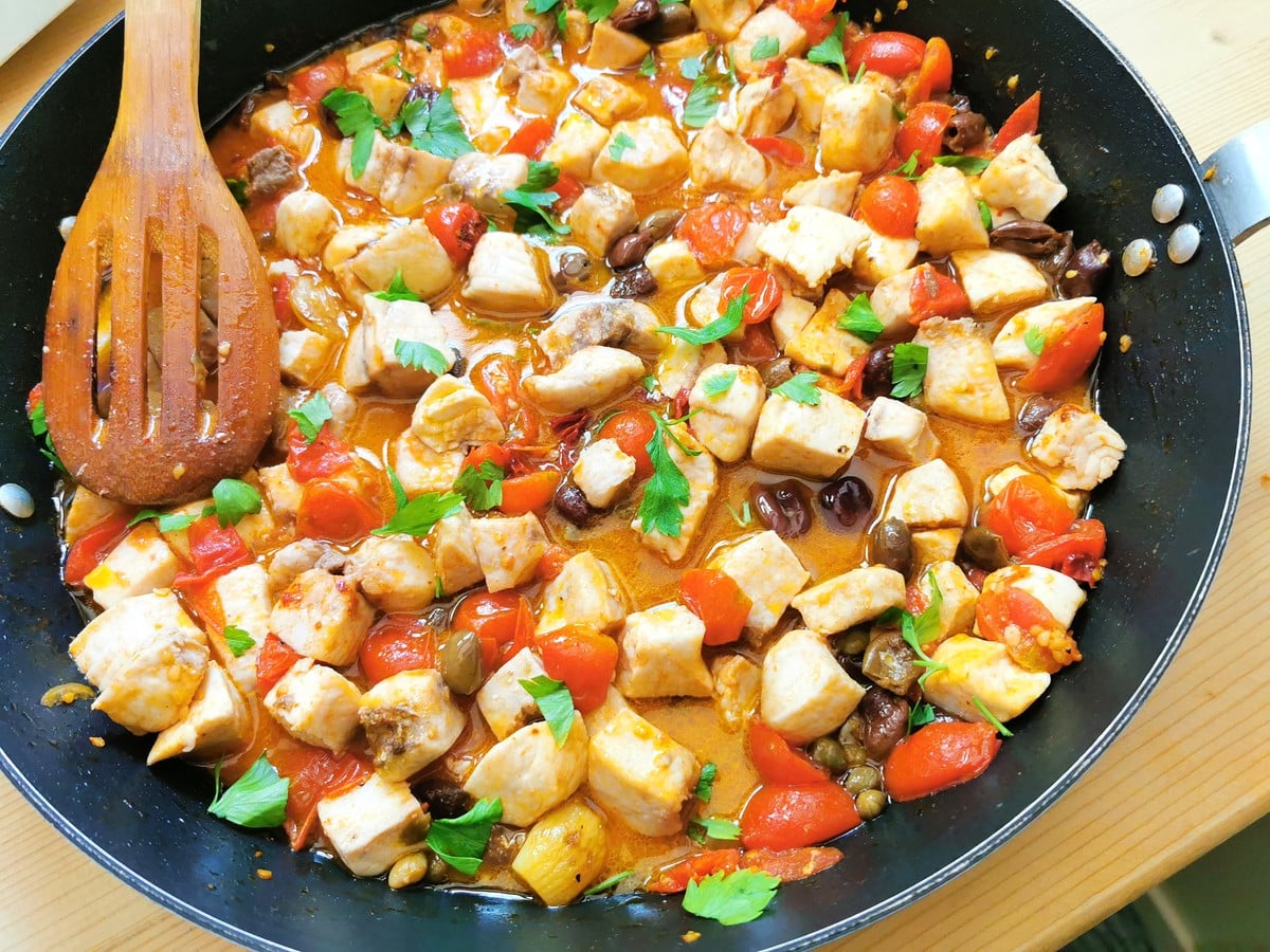 swordfish sauce cooking in skillet