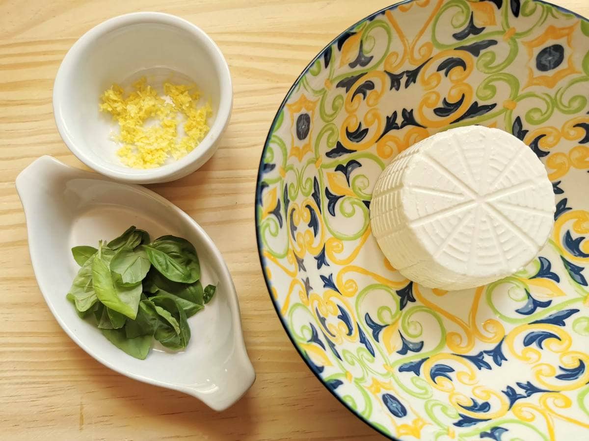 Ricotta, basil and lemon in bowls