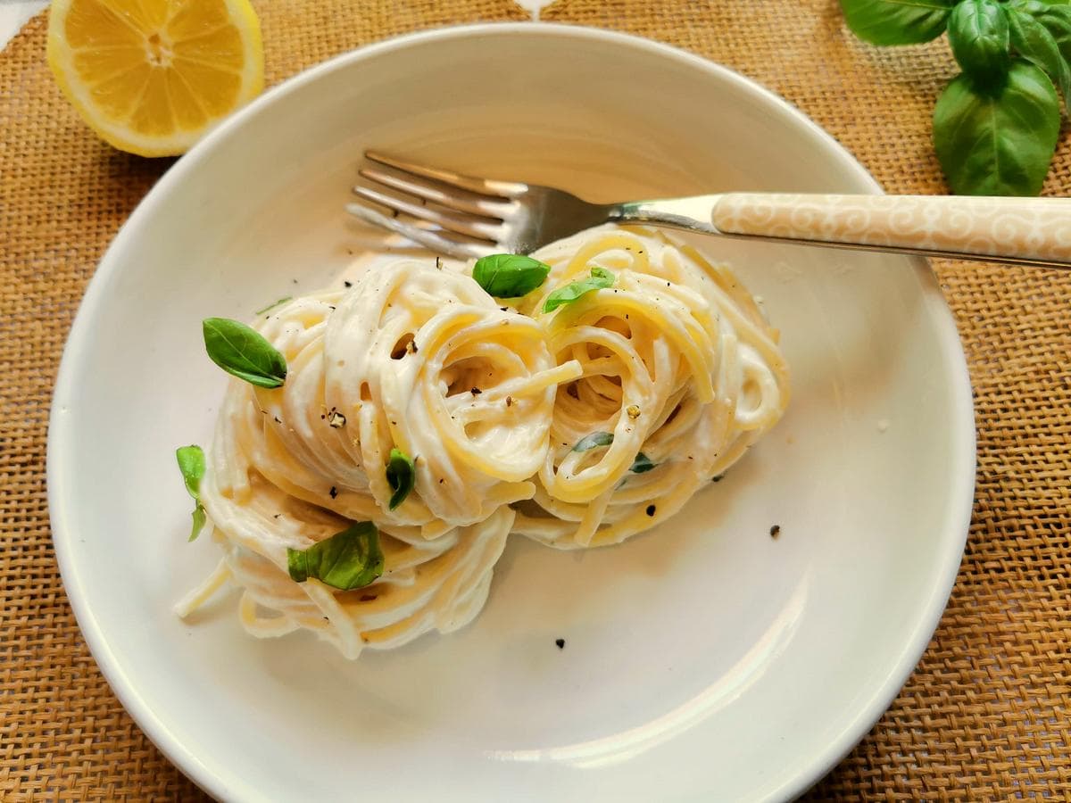 Lemon Ricotta Pasta in a bowl garnished with basil