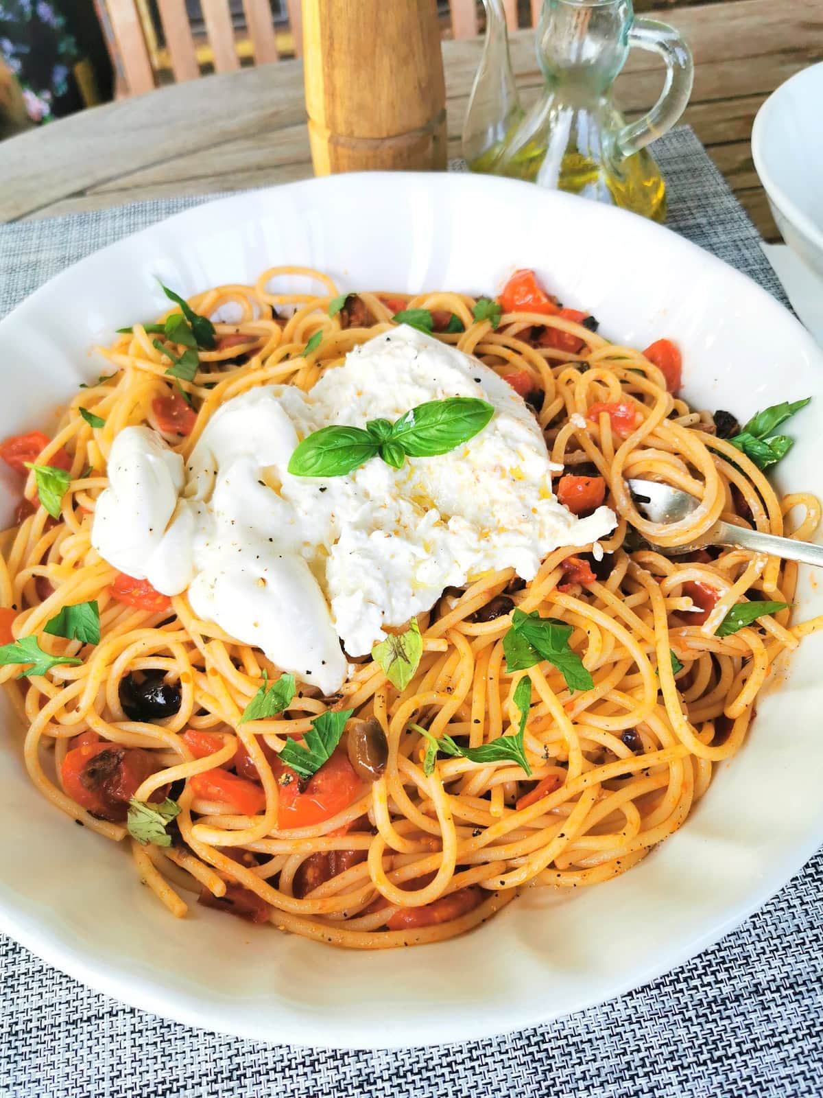 Spaghetti alla checca in large serving bowl.