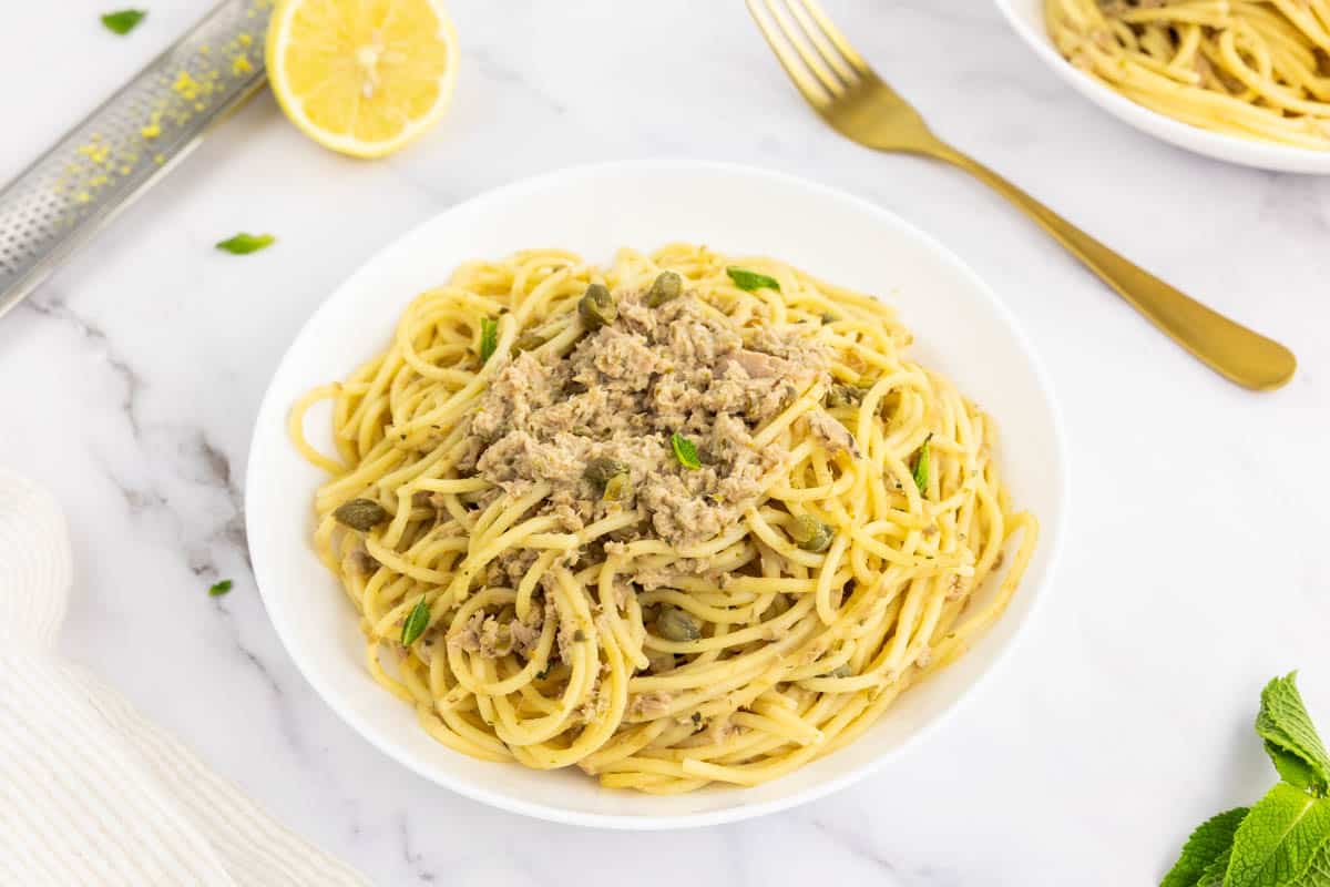 Canned tuna pasta garnished with mint.