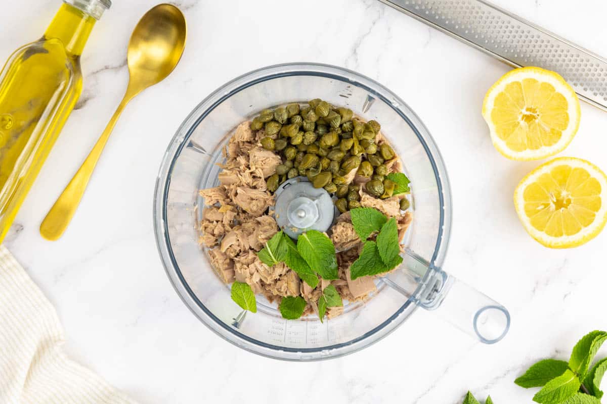 Canned tuna, capers and mint in a food processor