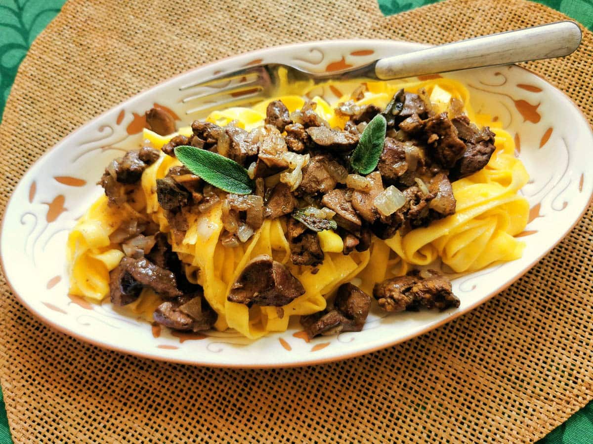 Tagliatelle pasta with chicken livers on a plate