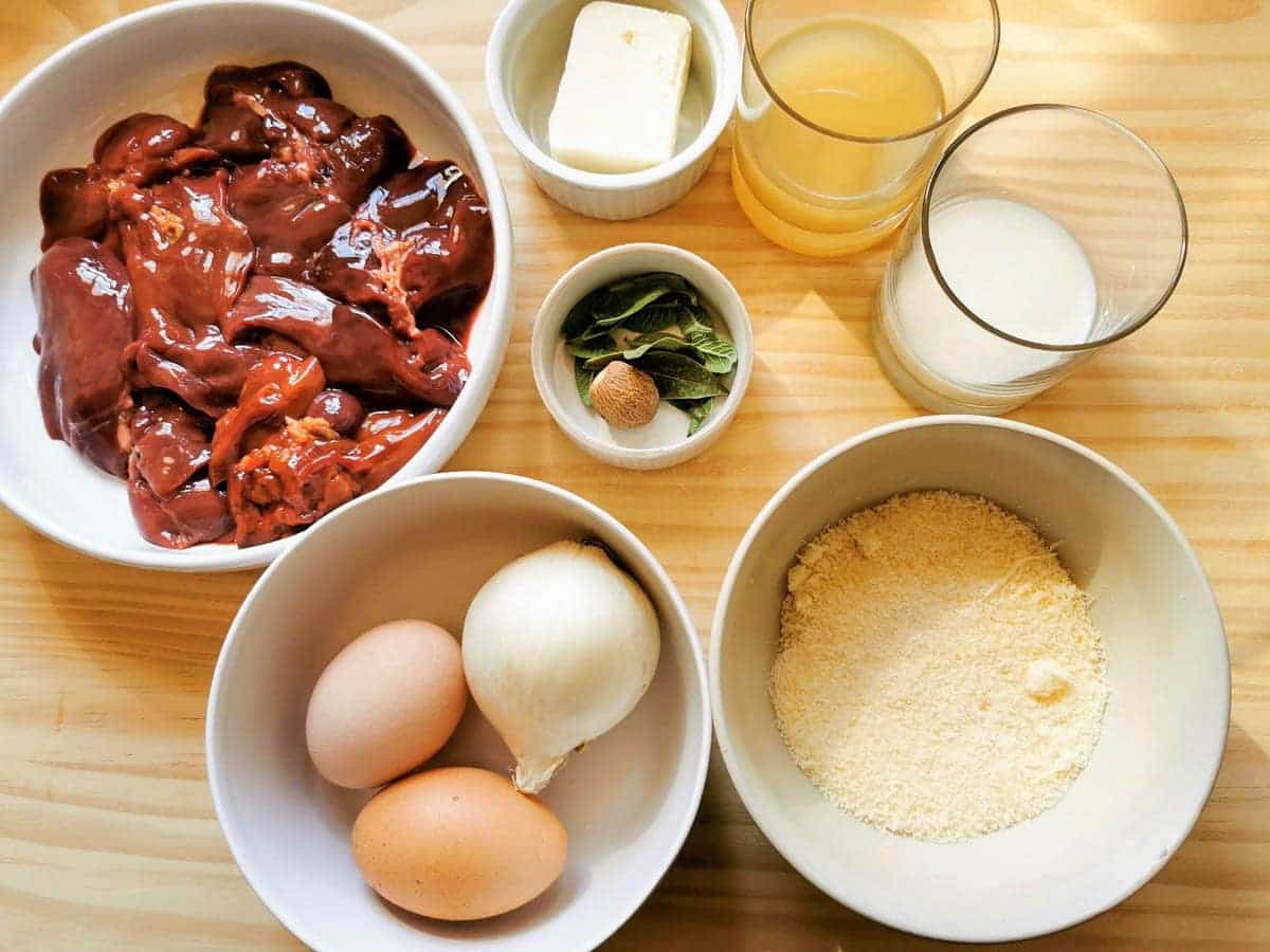 Ingredients for chicken liver pasta: Includes chicken livers, white onion, butter, eggs, bay leaf, sage leaves, chicken broth, milk, Parmesan cheese, nutmeg.