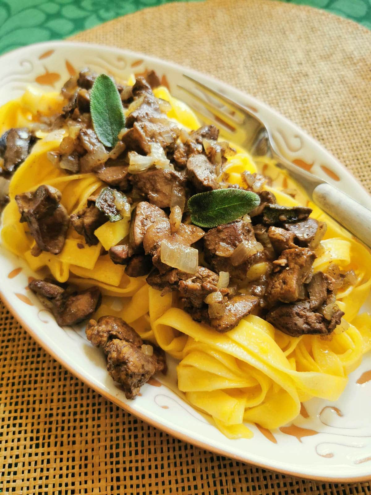 Tagliatelle pasta with chicken livers on a plate