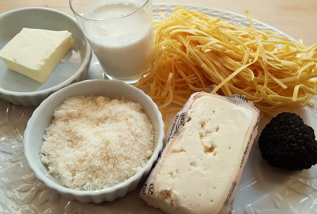 Ingredients for tagliolini with taleggio and black truffle 