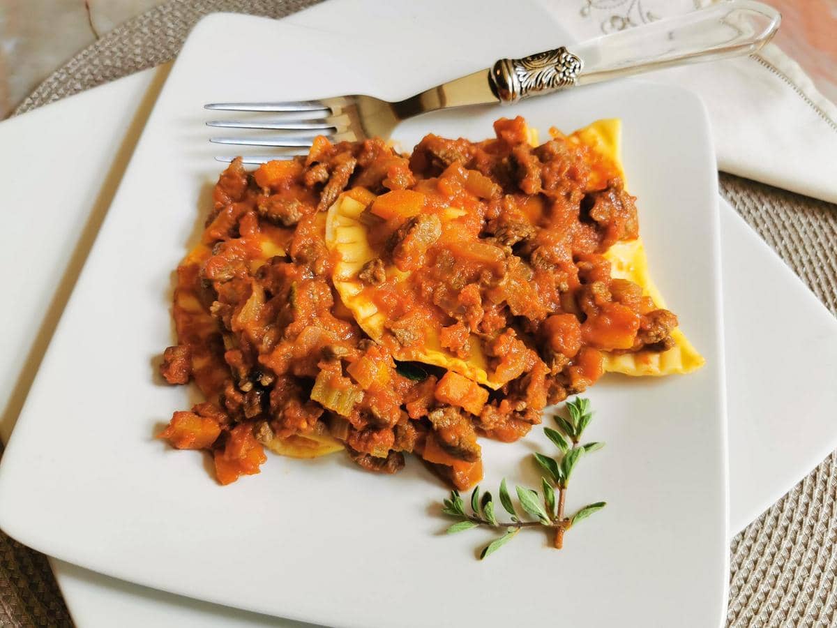 Homemade ricotta ravioli with steak ragu recipe from Marche.