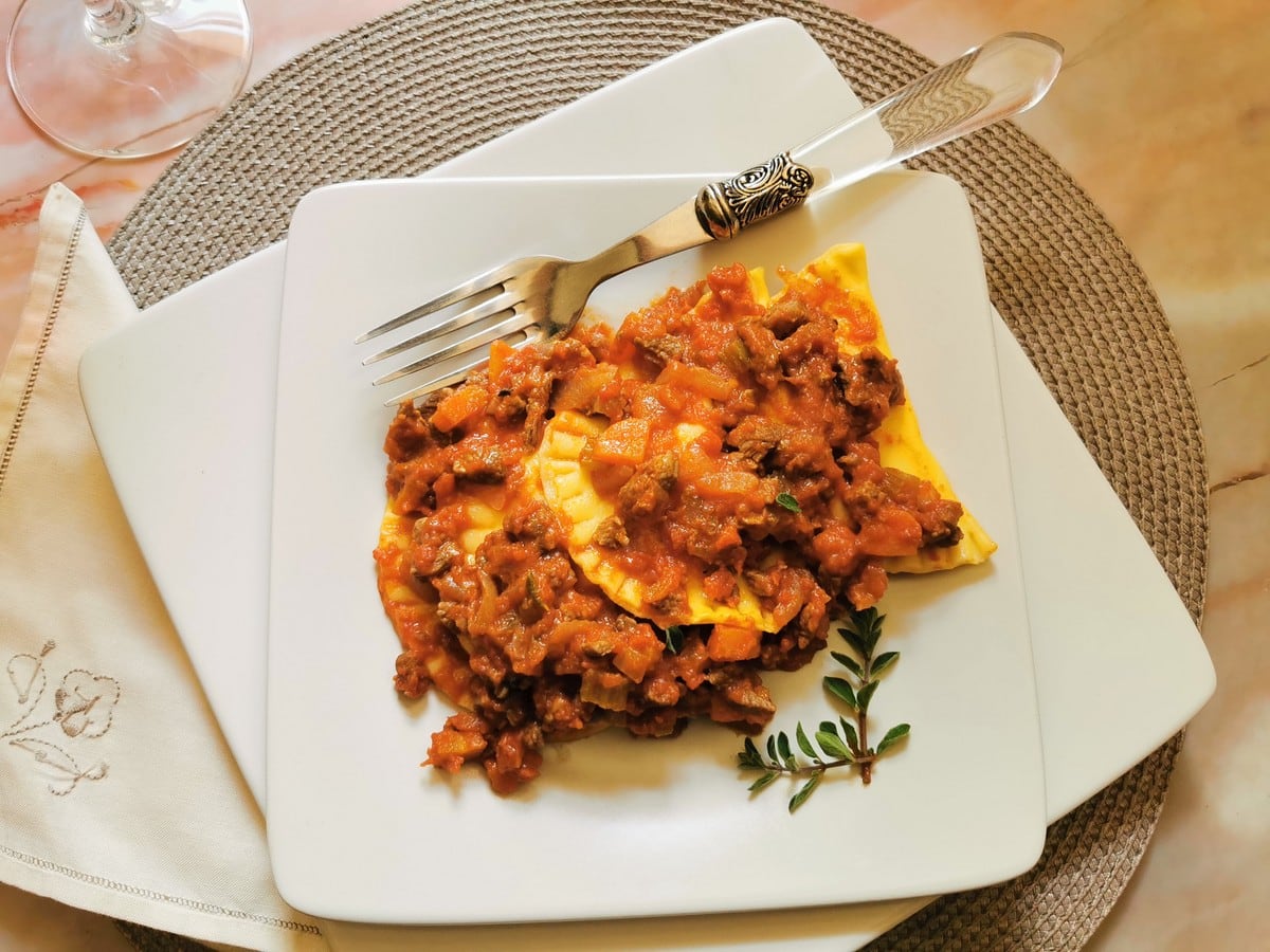 homemade ricotta ravioli with steak ragu.