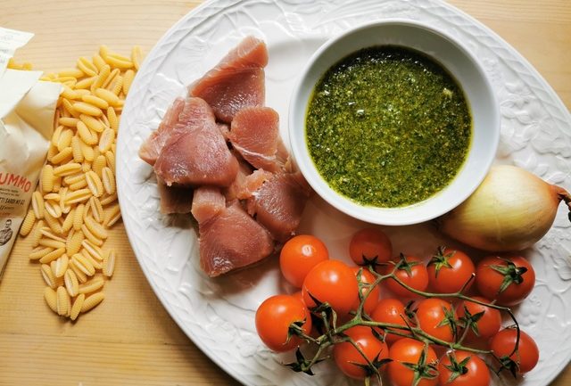 ingredients for malloreddus alla carlofortina on white plate