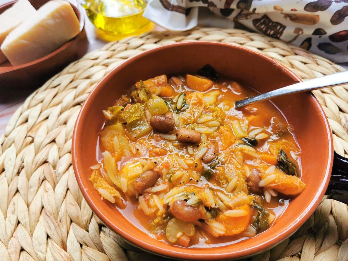 Tuscan minestrone in earthenware bowl.