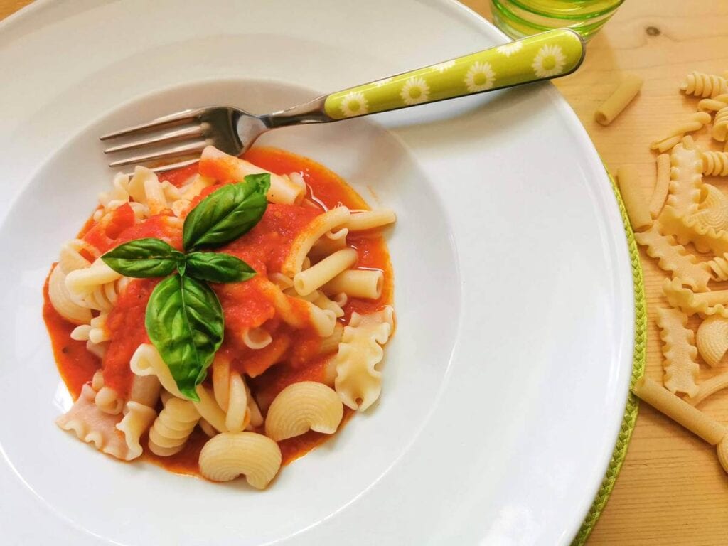 Tuscan pomarola sauce with mixed pasta. A vegan pasta recipe from Tuscany.