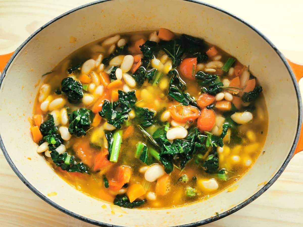 vegetables and beans with vegetable stock in Dutch oven