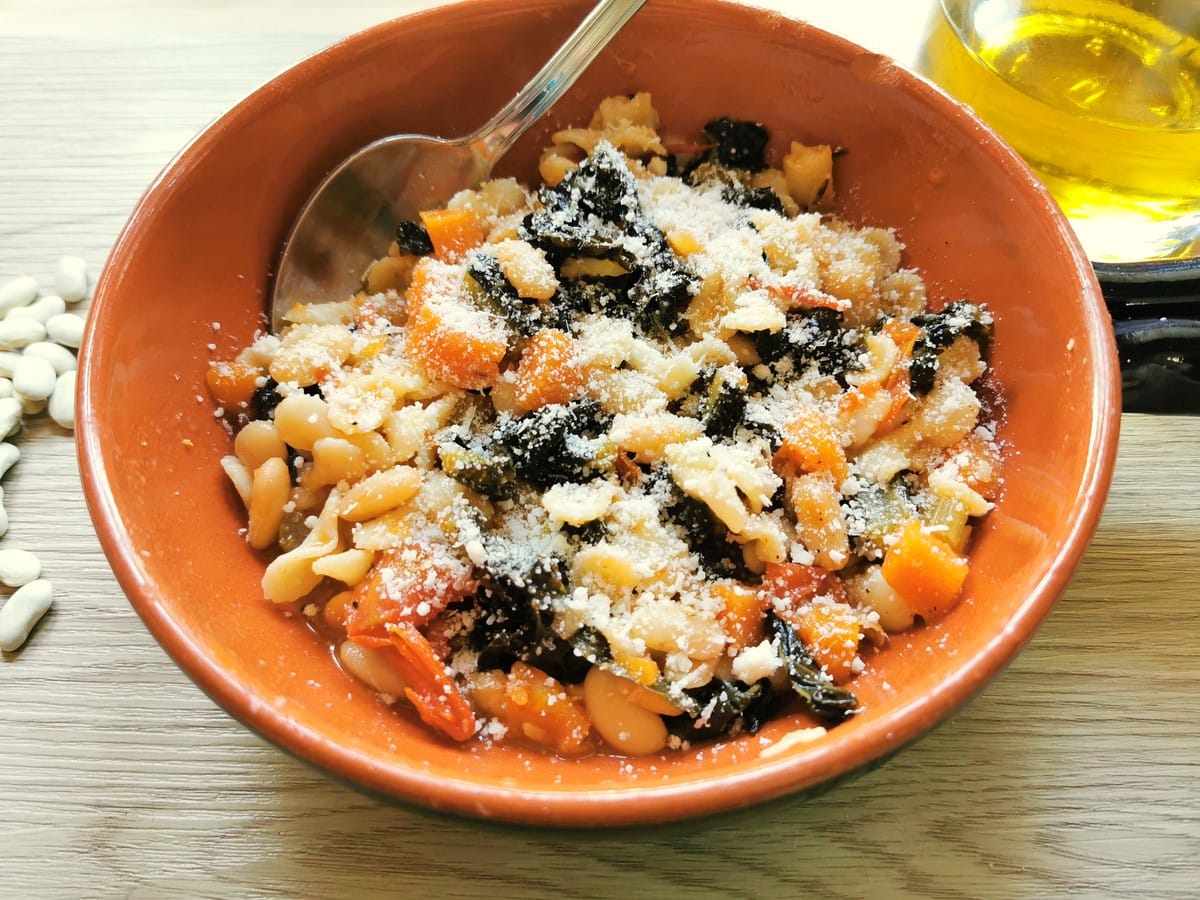 Tuscan kale, white bean and pasta soup with grated parmigiano sprinkled on top.