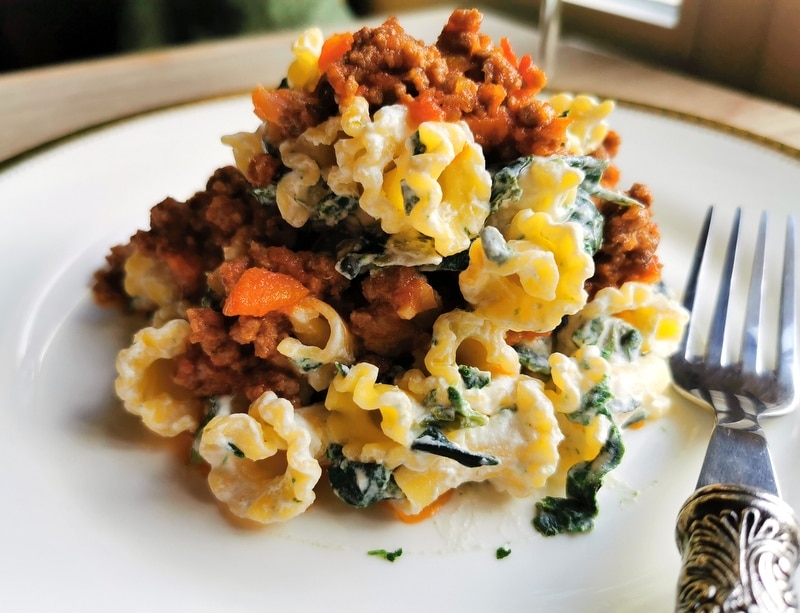 Tuscan Pasta Tordellata with ragu, Swiss chard and ricotta.