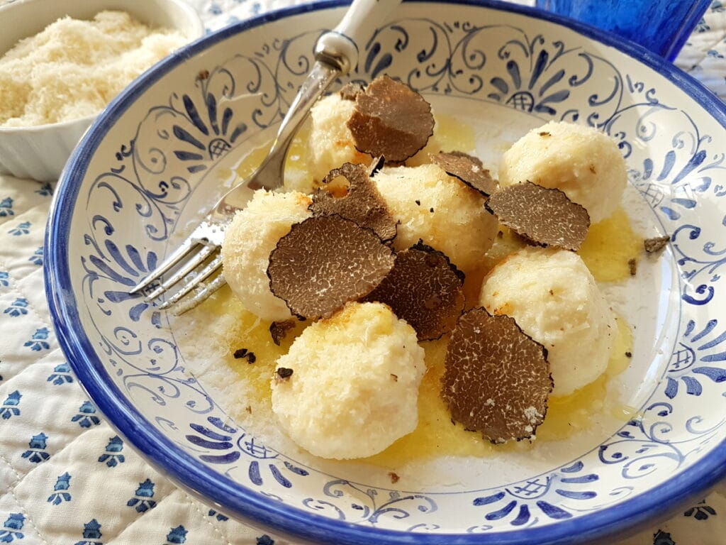 ricotta gnudi gnocchi with black truffle