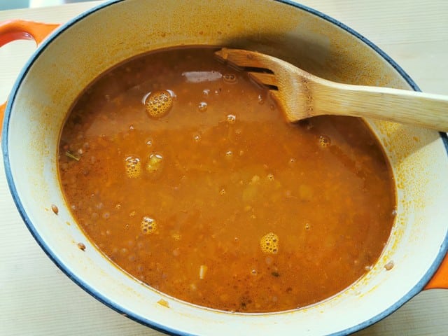 Lentil soup cooking in Dutch oven