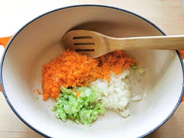 finely chopped carrots, celery and onion in Dutch oven