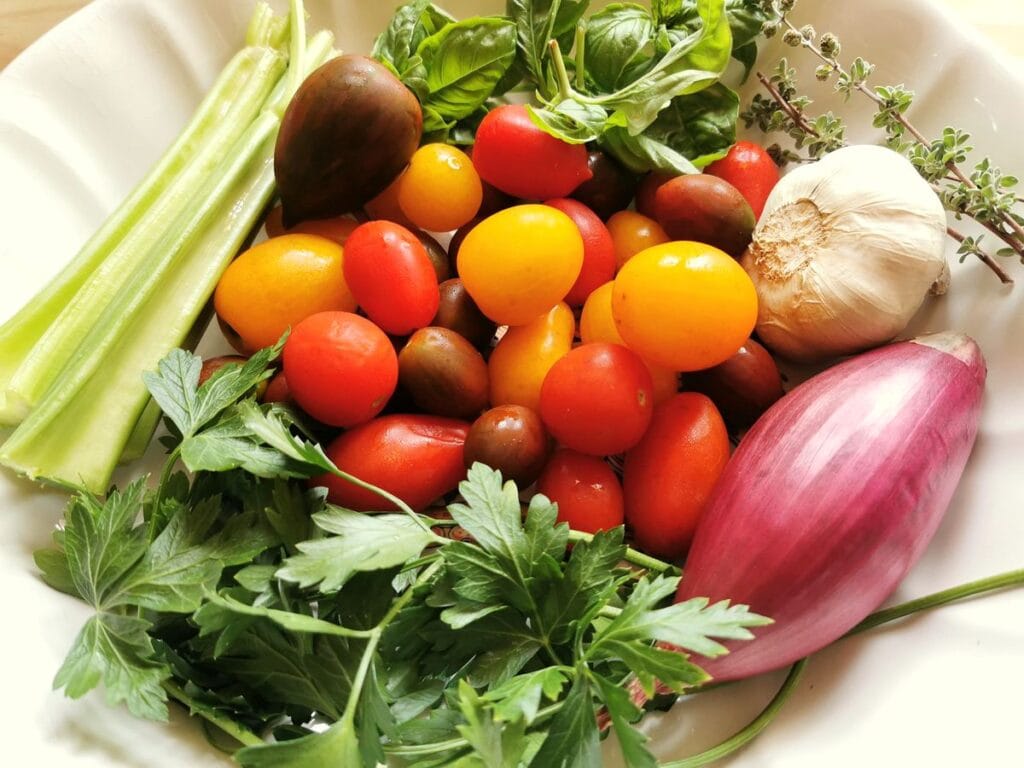 ingredients for vermicelli di positano on white plate