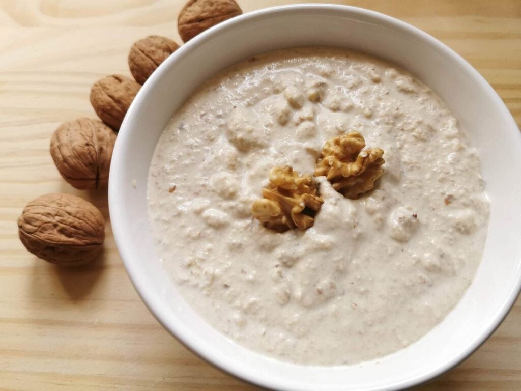 Ligurian walnut sauce in white bowl