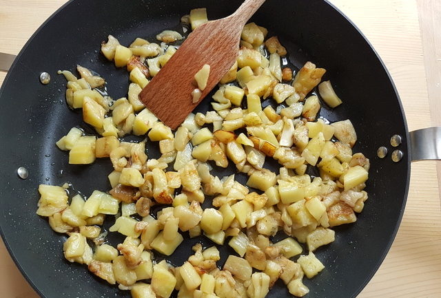 pieces of eggplant in frying pan