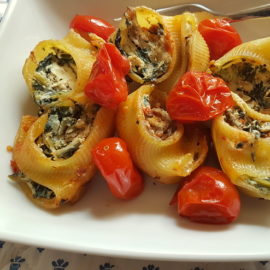 baked lumaconi pasta shells with ricotta, chicory and porcini