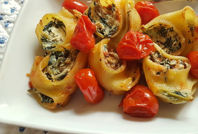 baked lumaconi pasta shells with chicory and porcini