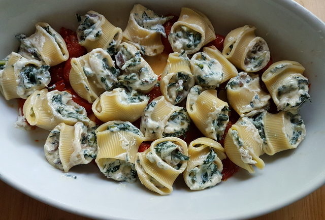 baked lumaconi pasta shells with chicory and porcini 