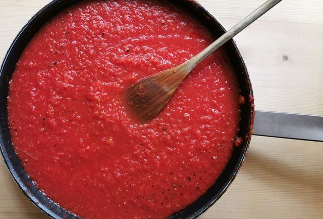 tomato sauce cooking in skillet