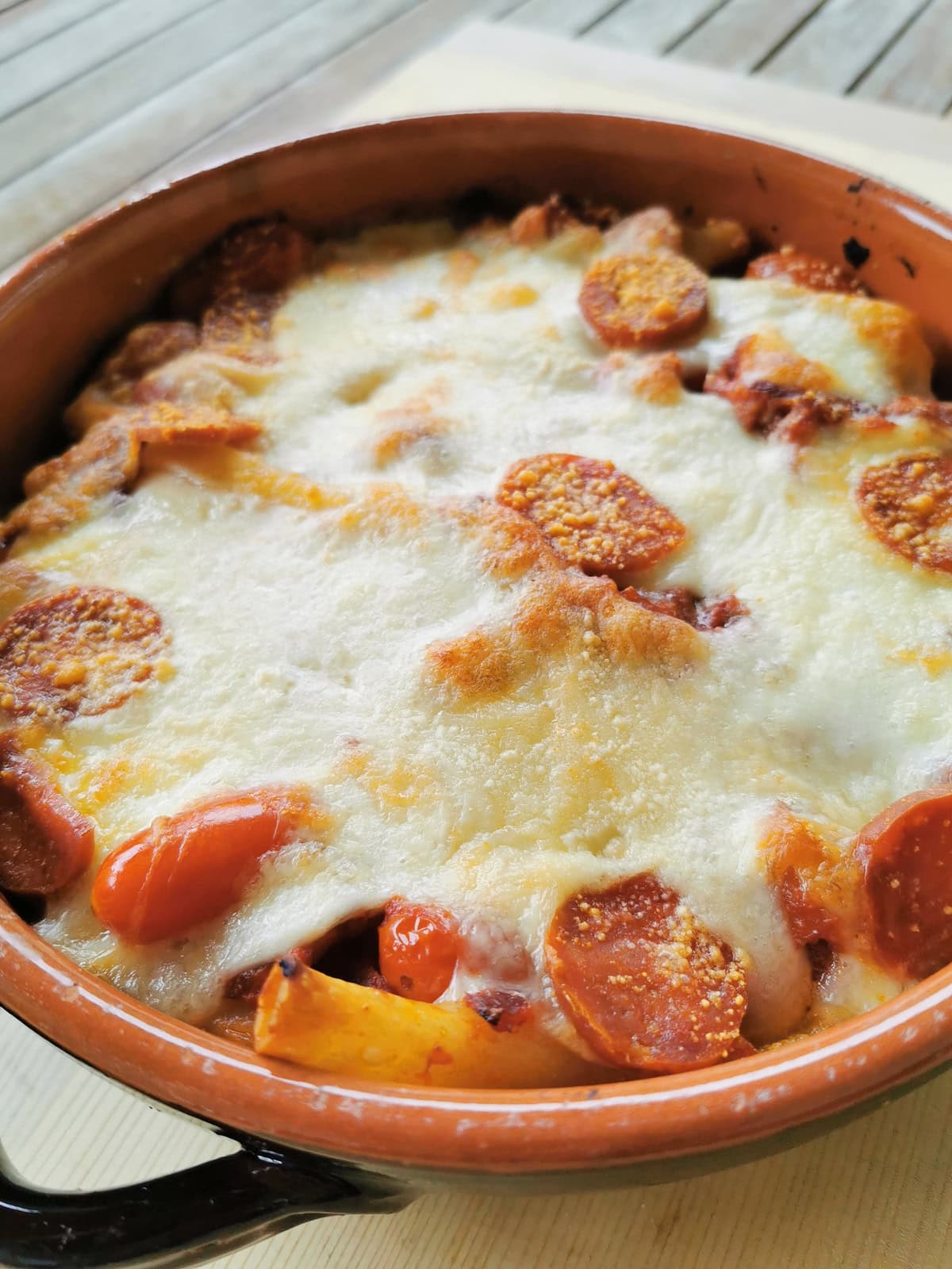 Spicy sausage pasta in a baking dish.