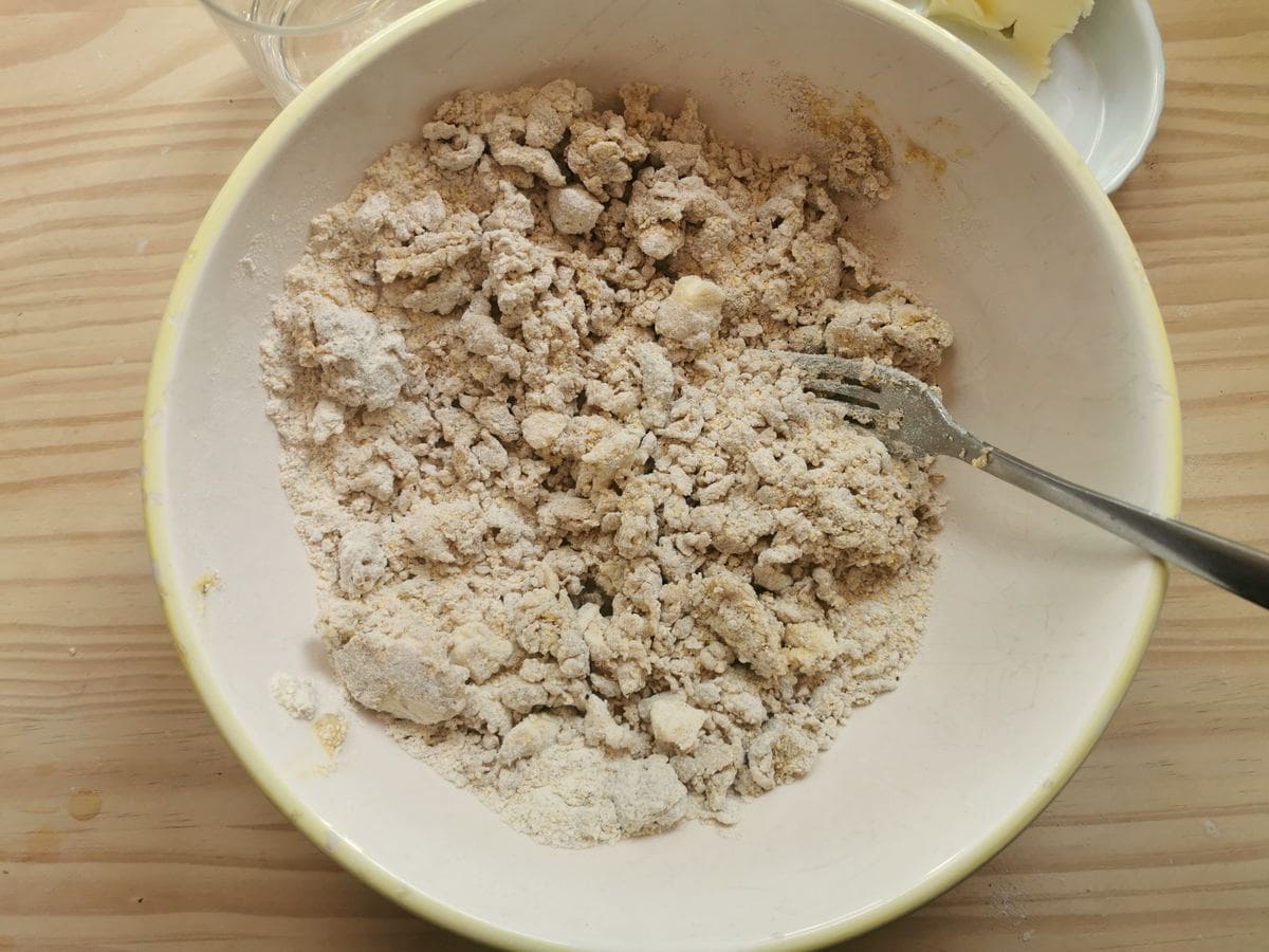 Flour, eggs and butter mixed together in a bowl to start the blecs dough.