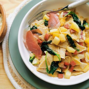 Homemade blecs buckwheat pasta with potatoes and speck