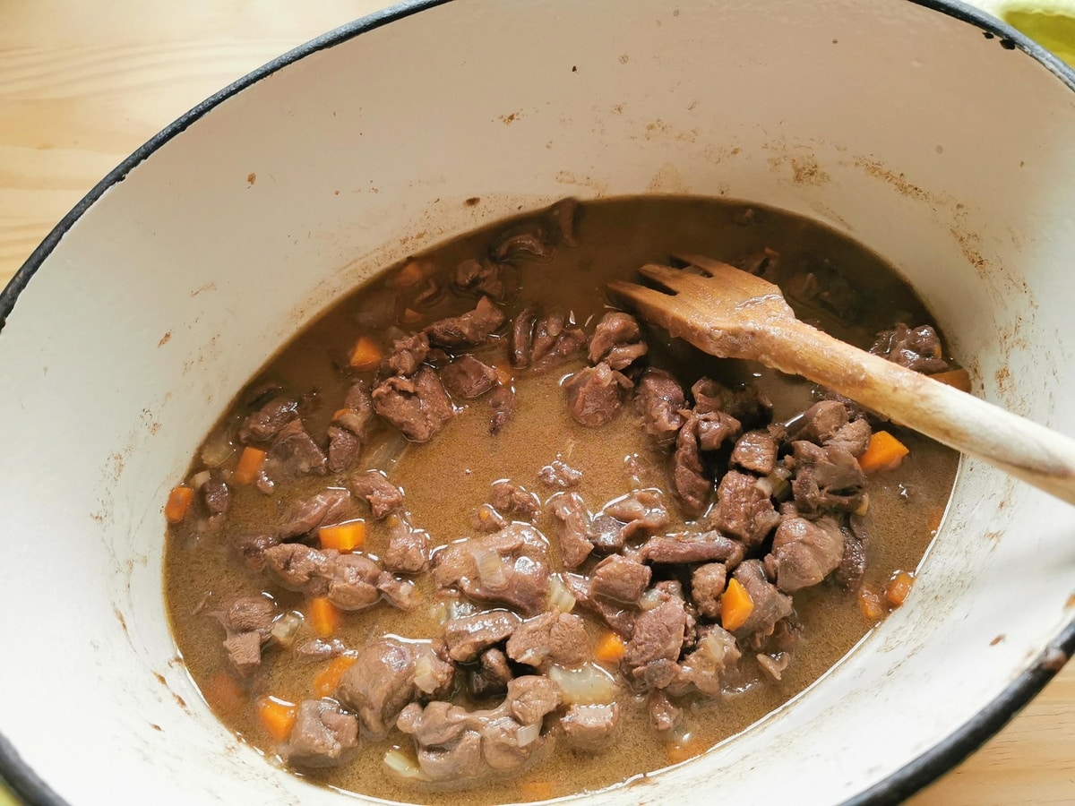 Braised hare ragu in Dutch oven.