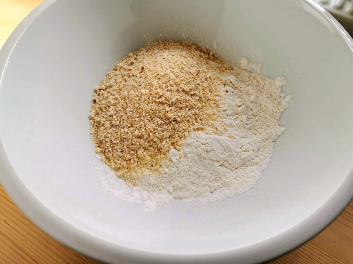 breadcrumbs and flour in white bowl