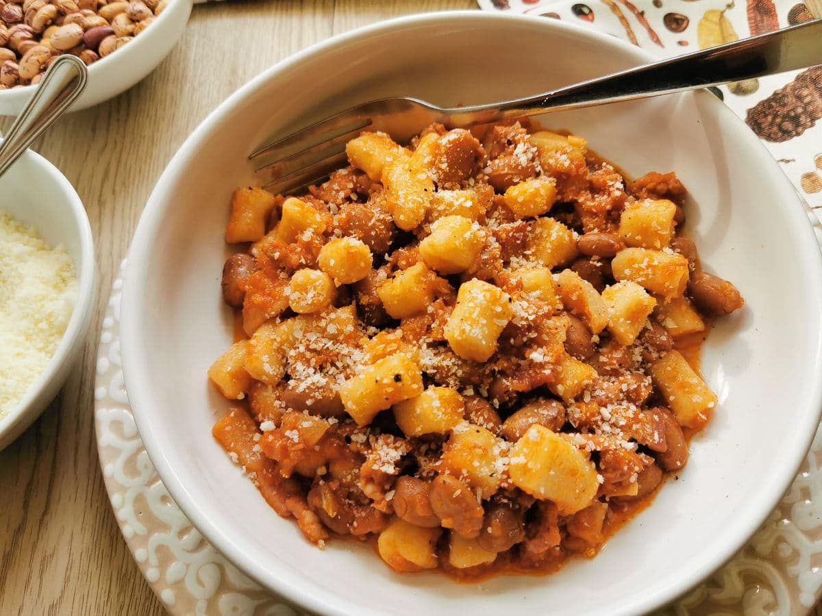 Bread gnocchi with sausage plated