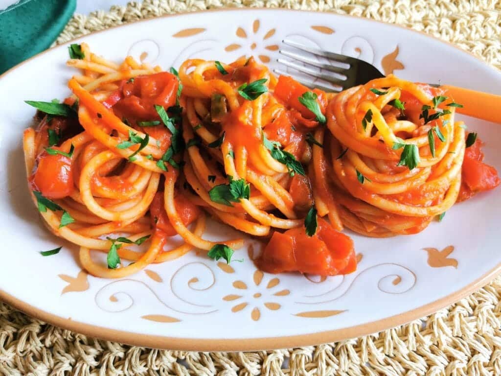 Bucatini all'arrabbiata from Rome. A vegetarian summer pasta recipe.