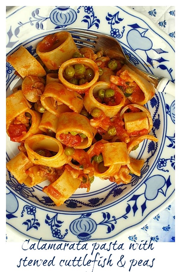 calamarata pasta with stewed cuttlefish and peas