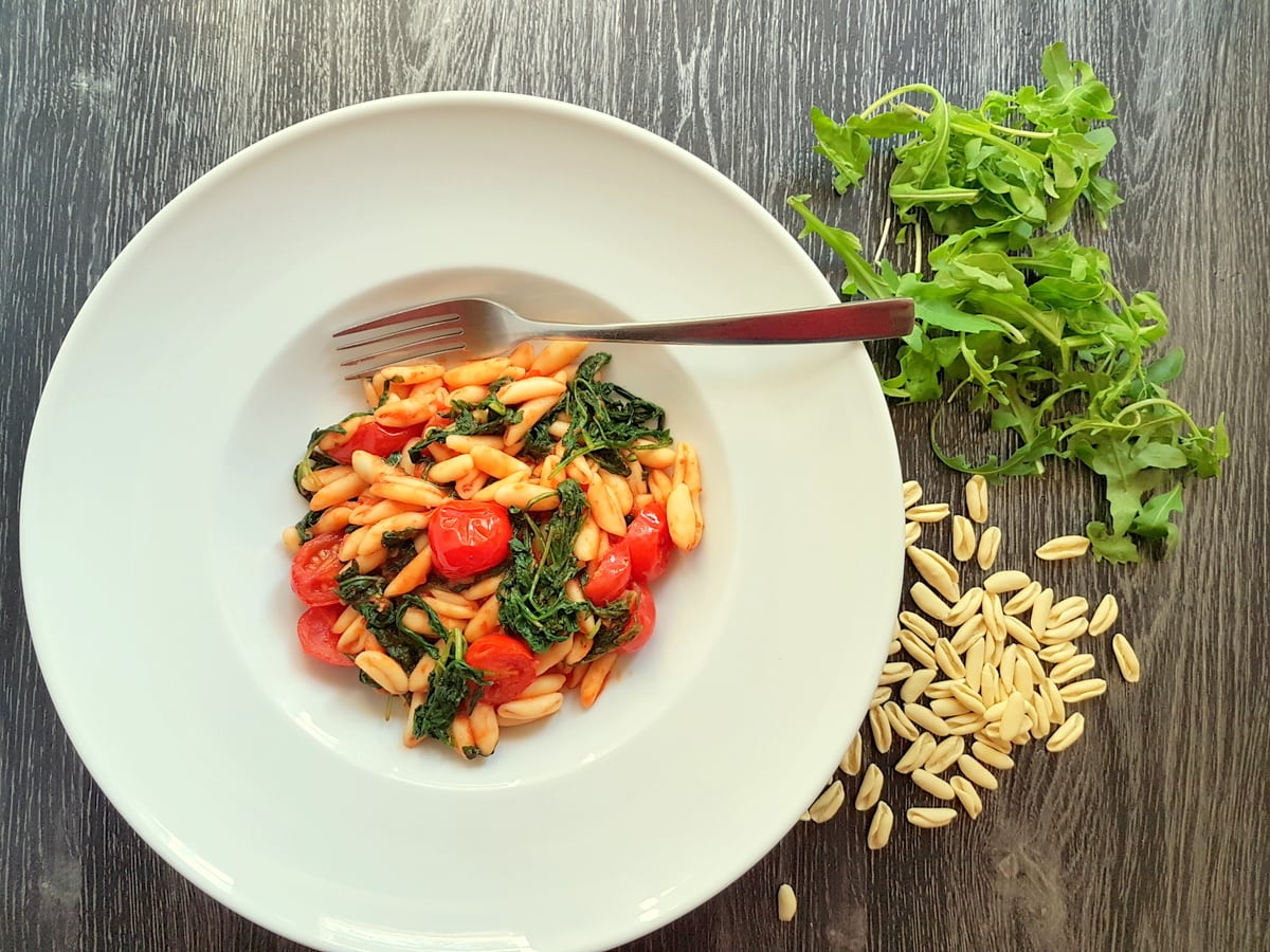 Cavatelli pasta with rocket (arugula).