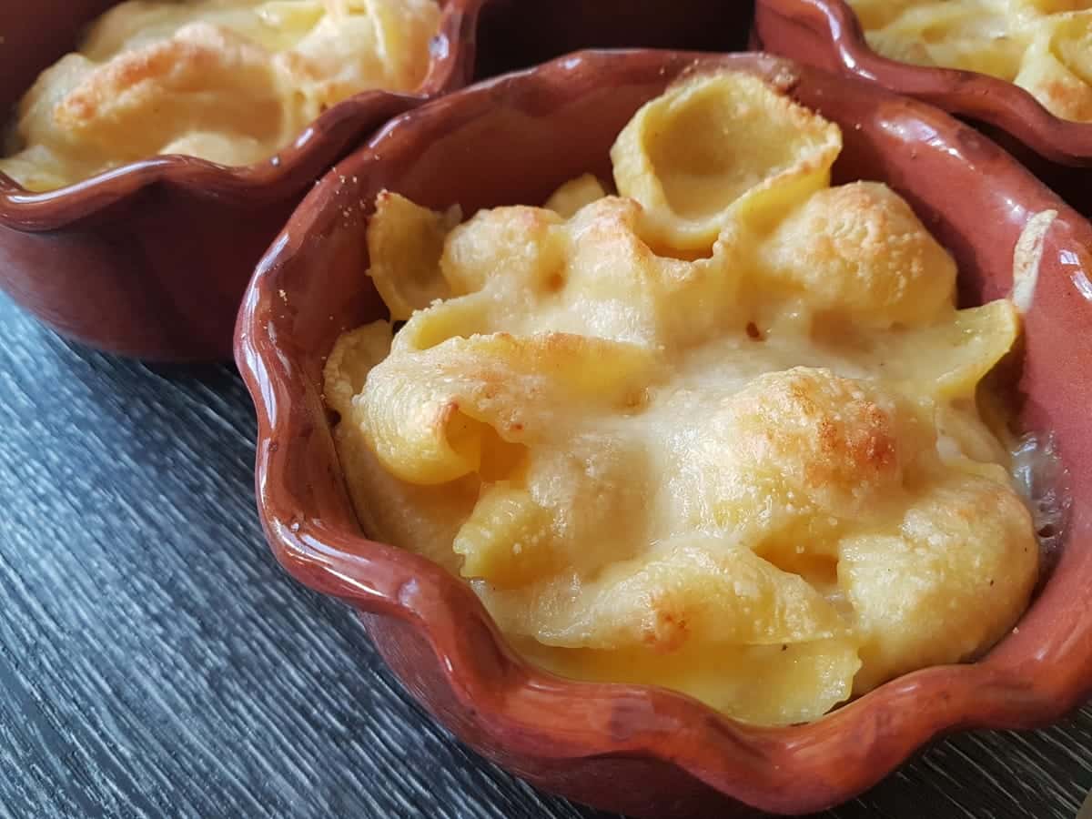 cheesy pasta shells in a dish