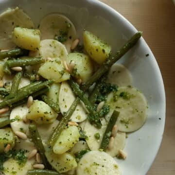 corzetti pasta Liguria with pesto, potatoes and green beans