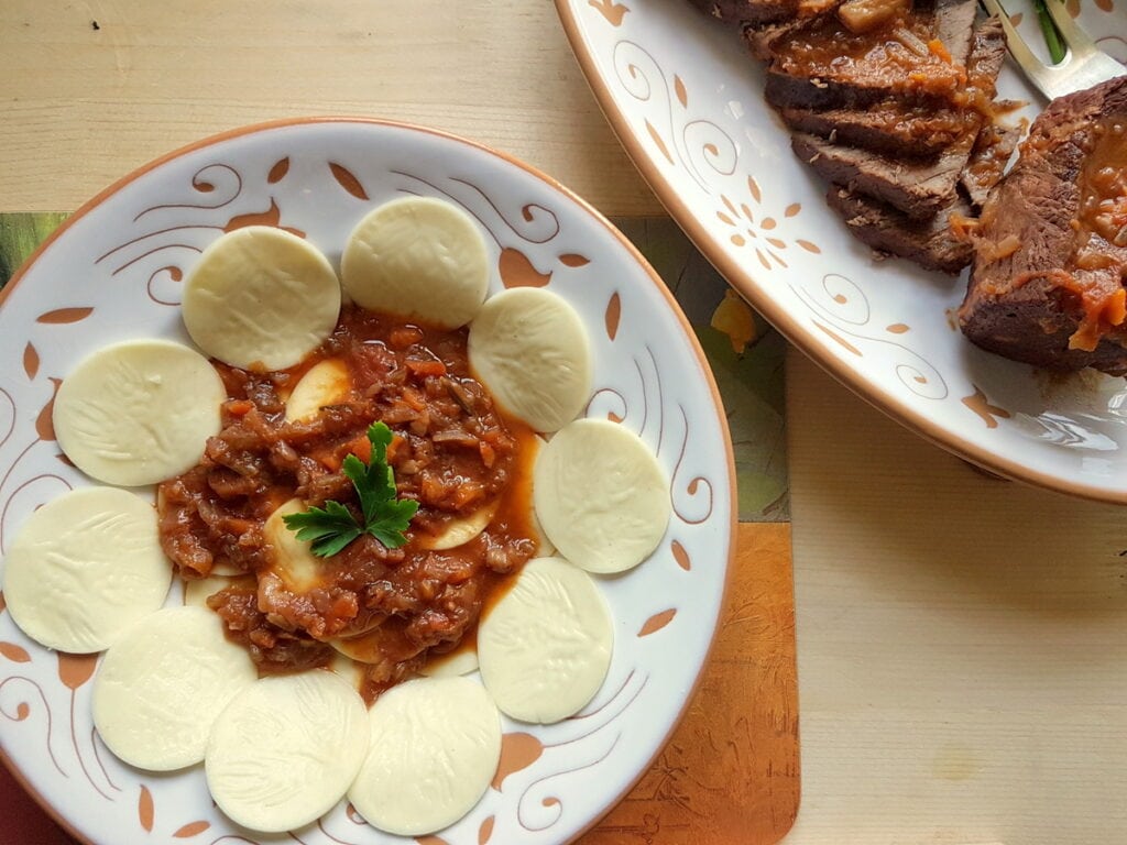 corzetti pasta with Genovese meat sauce