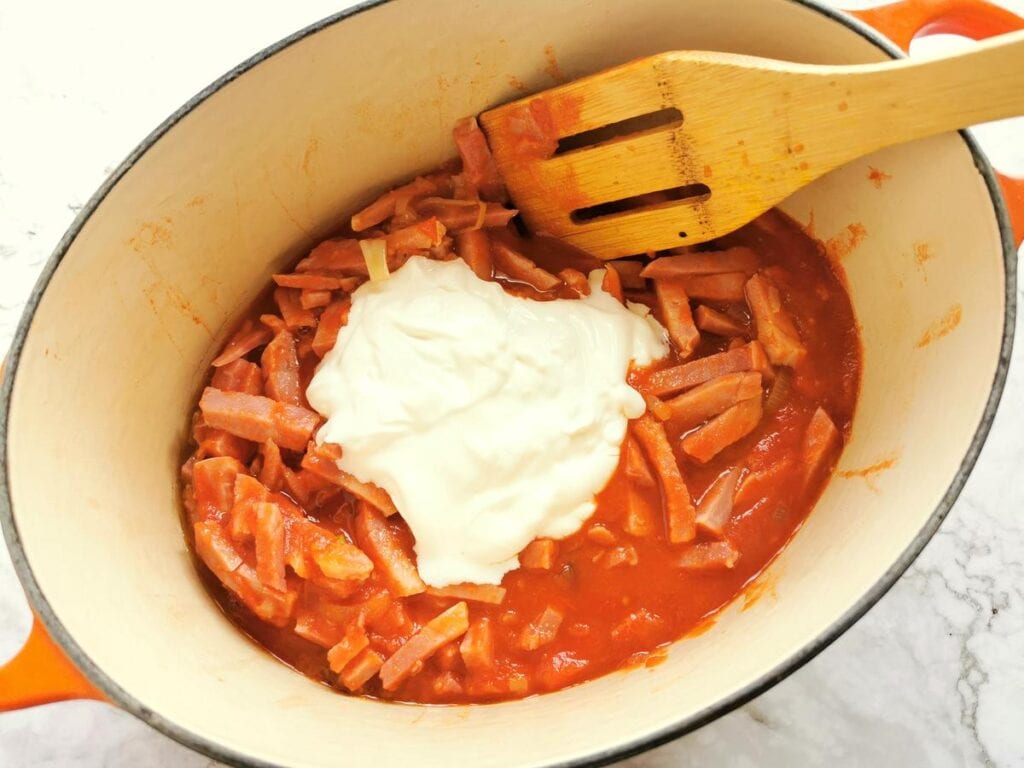 Heavy cream added to the tomato sauce.