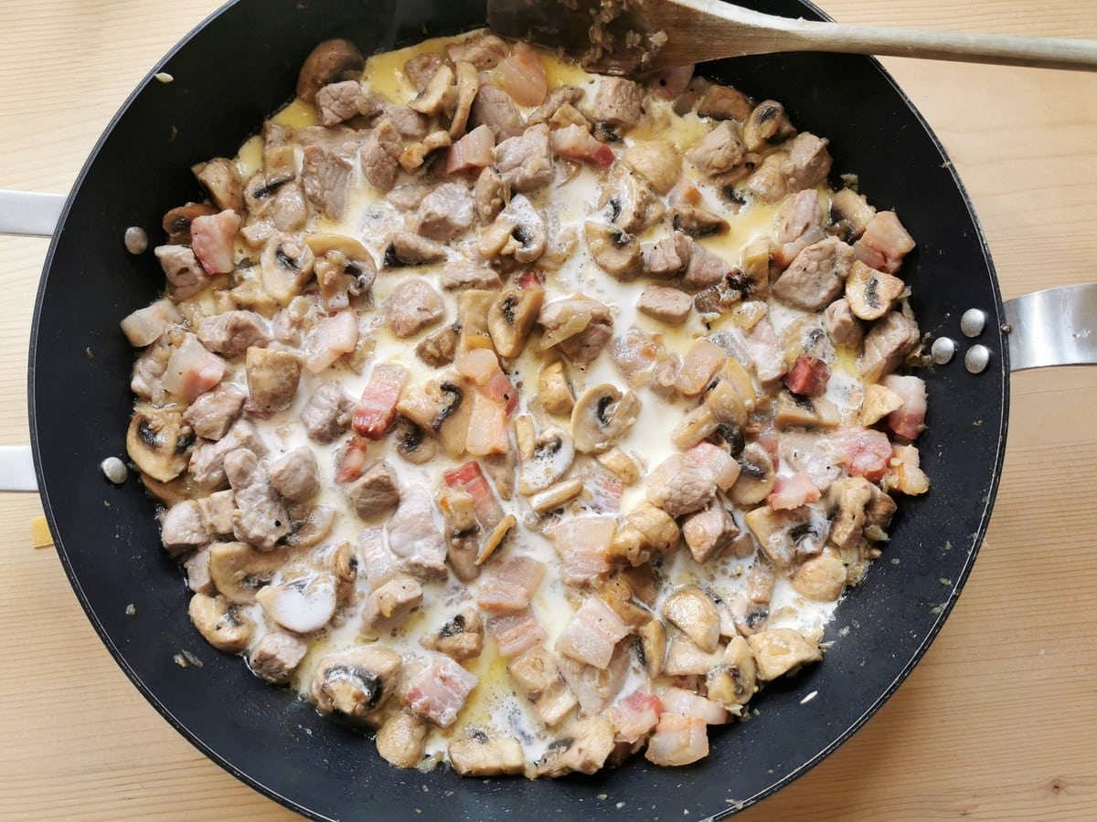 Ready mushroom and pork tenderloin sauce in skillet.