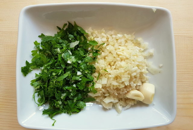 chopped parsley and fennel in white bowl