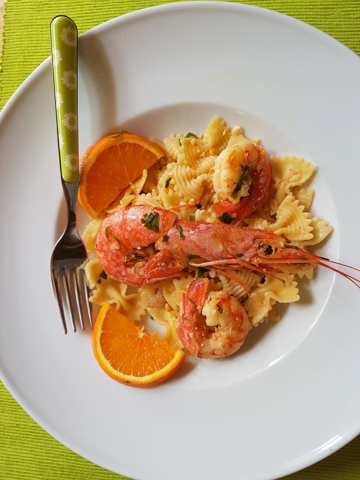 Farfalle pasta with prawns (shrimp) and orange.
