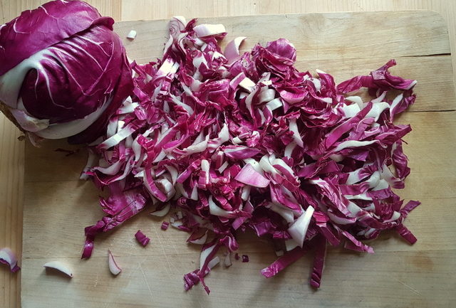 Shredded radicchio for fettuccine pasta with speck and radicchio (Italian chicory)