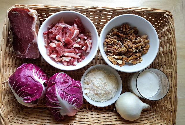 Ingredients in basket for fettuccine Pasta with speck and radicchio (Italian chicory)