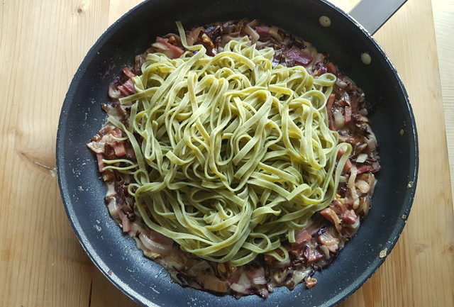 Sauce and fettuccine in frying pan for pasta with speck and radicchio recipe