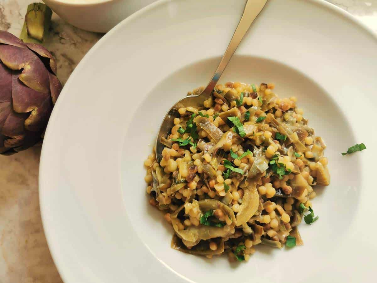 Fregola pasta with artichokes.